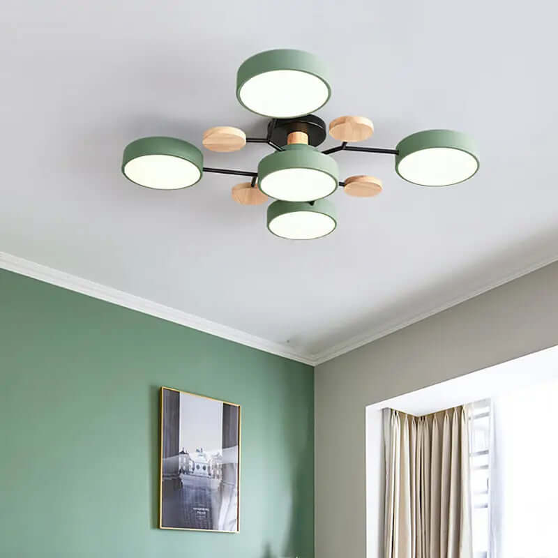 Stylish green and wood ceiling light fixture illuminating a modern living space with elegant decor.